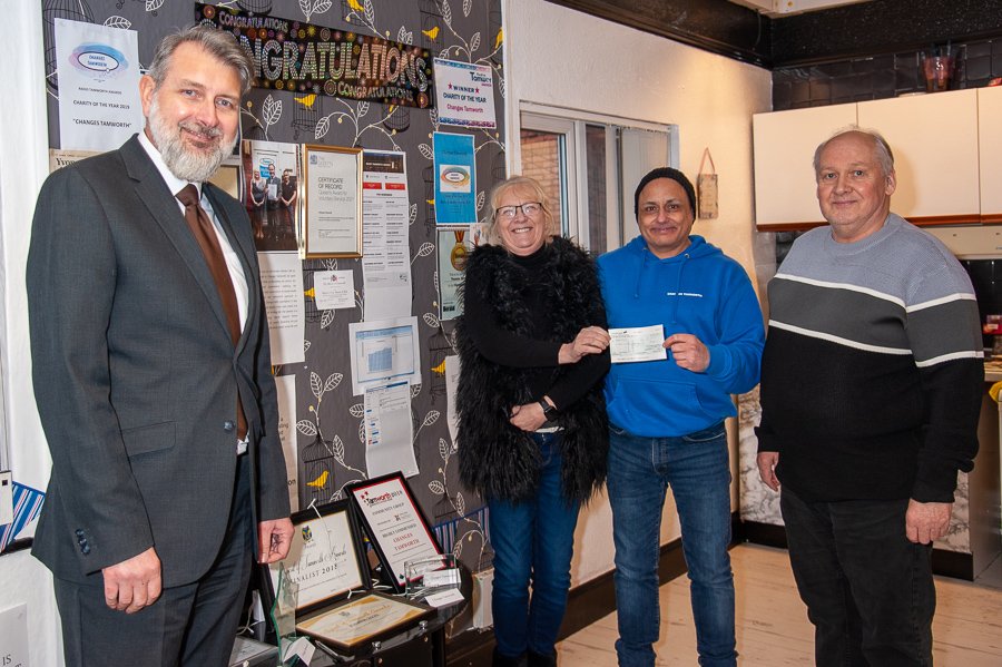 Tamworth Co-op funeral manager Glen Speak at cheque presentation to Changes representatives